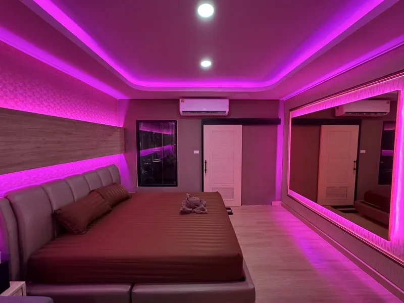 KK Club Khon Kaen private themed room with pink LED lighting, mirror wall and en-suite shower